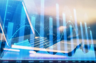 Finansal grafik renkli çizimler ve arka planda bilgisayar olan tablolar. Çoklu maruz kalma. Uluslararası pazarlar kavramı.