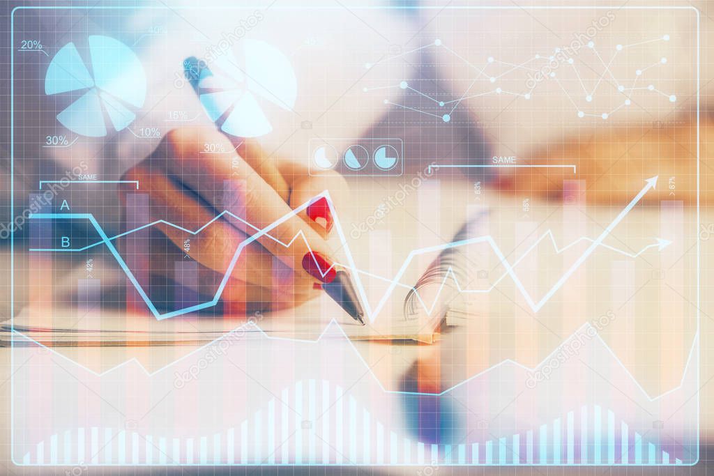 Double exposure of womans hands making notes with forex graph hologram. Concept stock market analysis.