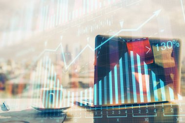 Finansal grafik renkli çizimler ve arka planda bilgisayar olan tablolar. Çoklu maruz kalma. Uluslararası pazarlar kavramı.