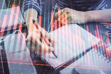 Finansal grafik el notları arka plan alarak üzerinde çizilmiş. Araştırma kavramı. Çift Pozlama