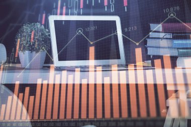 Finansal grafik renkli çizimler ve arka planda bilgisayar olan tablolar. Çoklu maruz kalma. Uluslararası pazarlar kavramı.