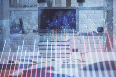 Arka planda eski pazar grafik hologramı ve kişisel bilgisayar var. Çoklu maruz kalma. Yatırım kavramı.