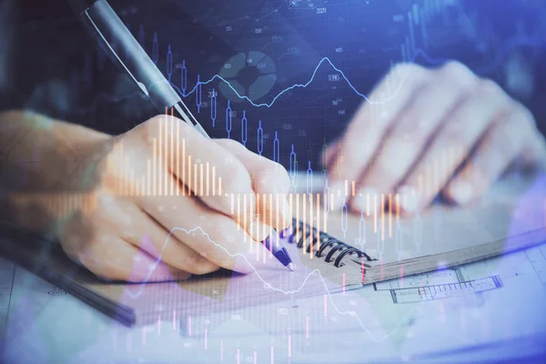 Forex graph on hand taking notes background. Concept of research. Double exposure — Stock Photo, Image