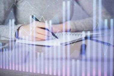 Hands Not defteri hisse senedi piyasası hakkında bilgi yazma. Ön Forex grafik hologramlar. Araştırma kavramı. Çoklu pozlama
