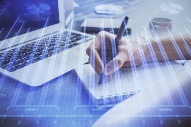 Forex tablosu WOMANS el notları arka plan alarak görüntülenir. Araştırma kavramı. Çoklu pozlama