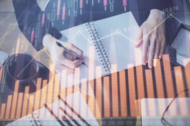 Forex grafik hologram el notları arka plan alarak. Analiz kavramı. Çoklu pozlama