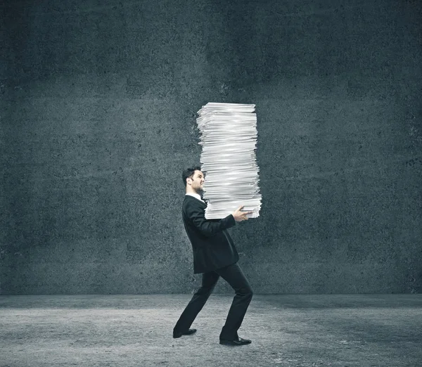Businessman holding pile documents — 스톡 사진