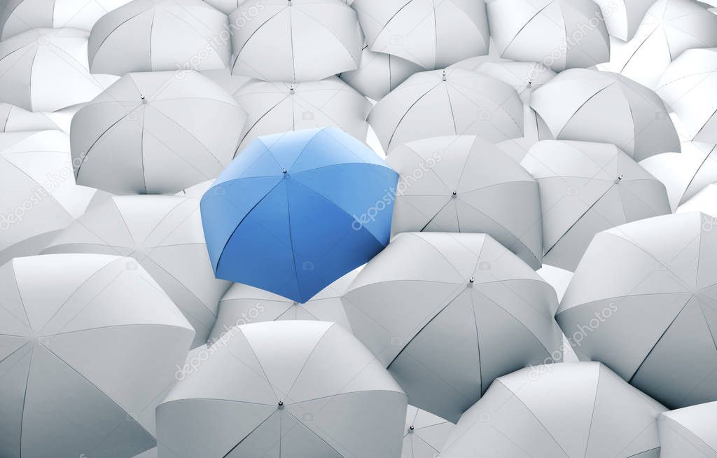 Blue umbrella in mass of white umbrellas.