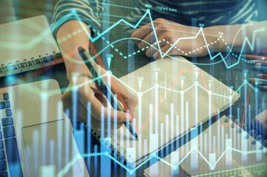 Finansal grafik el notları arka plan alarak üzerinde çizilmiş. Araştırma kavramı. Çift Pozlama