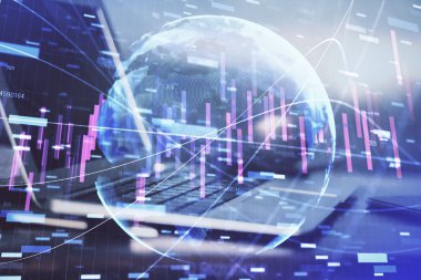 Finansal grafik renkli çizimler ve arka planda bilgisayar olan tablolar. Çifte maruziyet. Uluslararası pazarlar kavramı.