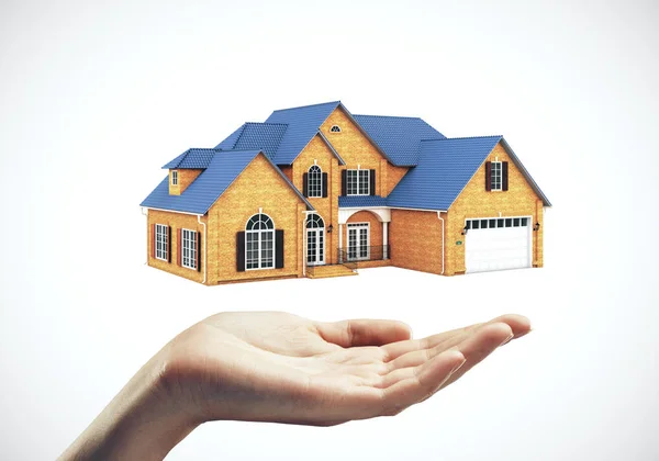 Hand holding model modern cottage. — Stock Photo, Image