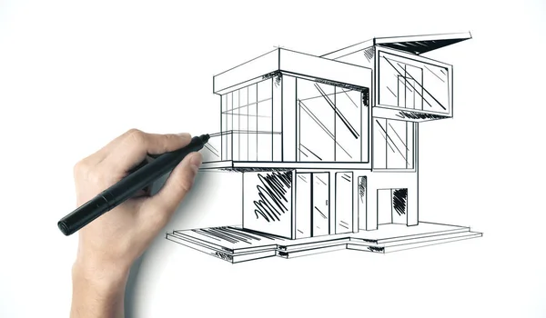 Ręka z piórem rysunek domek — Zdjęcie stockowe