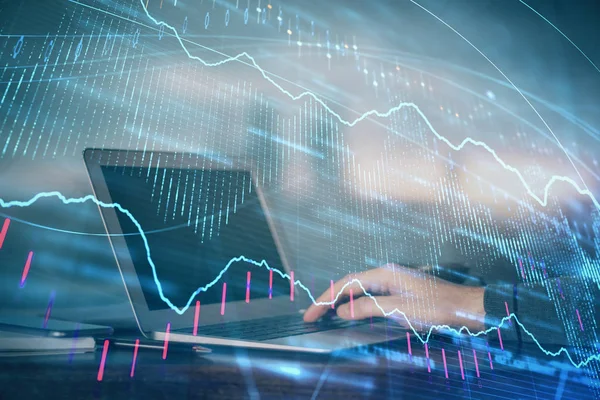 Double exposure of stock market graph with man working on laptop on background. Concept of financial analysis.