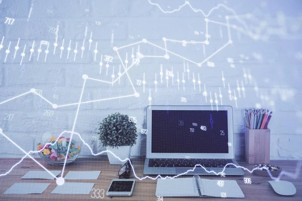 Financial graph colorful drawing and table with computer on background. Double exposure. Concept of international markets.