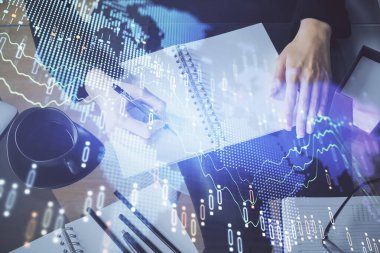 Forex grafik hologram el notları arka plan alarak. Analiz kavramı. Çoklu pozlama
