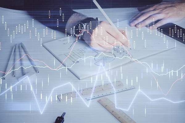 Doble exposición de las manos del hombre escribiendo notas del mercado de valores con el gráfico de divisas . —  Fotos de Stock