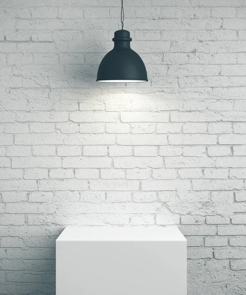 Blank brick wall, podium and lamp — Stock Photo, Image