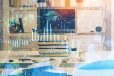 Finansal grafik renkli çizimler ve arka planda bilgisayar olan tablolar. Çifte maruziyet. Uluslararası pazarlar kavramı.