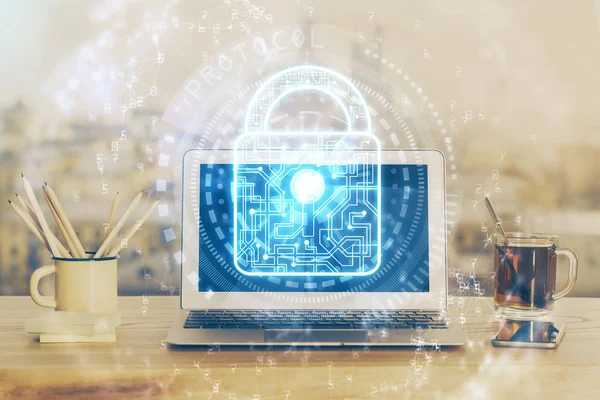 Doppelbelichtung des Desktops mit Computer- und Lock-Symbol-Hologramm. Konzept der Datensicherheit. — Stockfoto