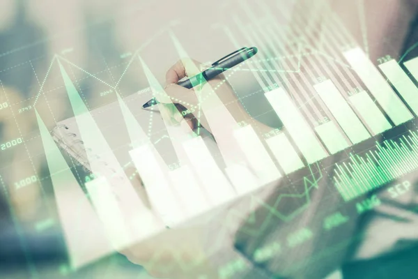 Multi exposure of hands making notes with forex chart huds. Stock market concept. — Stock Photo, Image