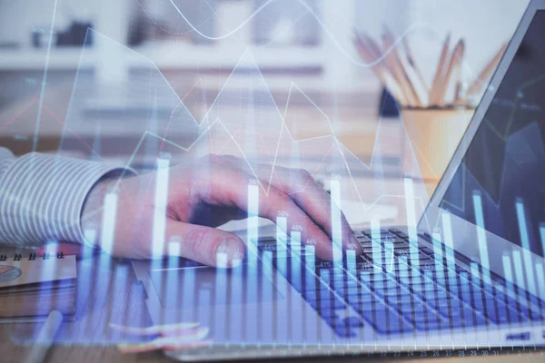 Double exposure of stock market graph with man working on laptop on background. Concept of financial analysis. — Stock Photo, Image