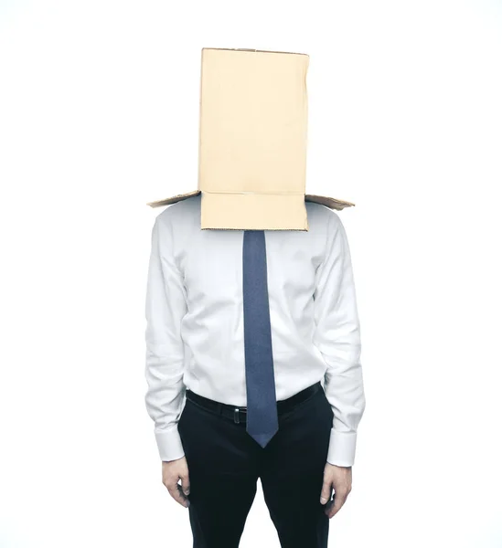 Podnikatel s krabicí na hlavu — Stock fotografie