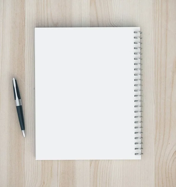 Blank note pad and pen on wooden table. — Stock Photo, Image
