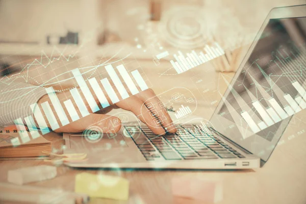 Double exposure of stock market graph with man working on laptop on background. Concept of financial analysis. — Stock Photo, Image
