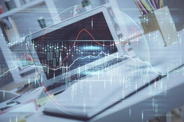 Finansal grafik renkli çizimler ve arka planda bilgisayar olan tablolar. Çifte maruziyet. Uluslararası pazarlar kavramı.