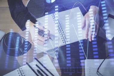 Forex grafik hologram el notları arka plan alarak. Analiz kavramı. Çoklu pozlama