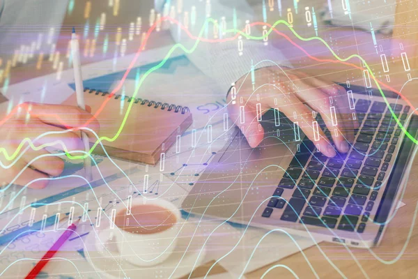 Forex graph with businessman working on computer in office on background. Concept of hardworking. Double exposure. — Stock Photo, Image