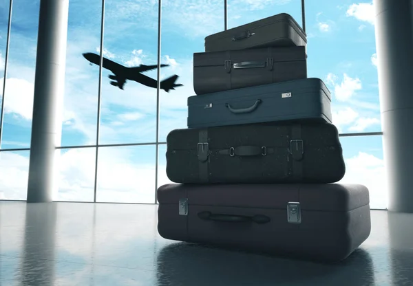 Bolsas de viaje en el aeropuerto y avión en el cielo — Foto de Stock