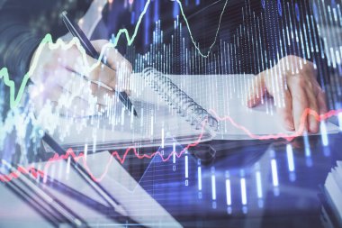 Forex grafik hologram el notları arka plan alarak. Analiz kavramı. Çoklu pozlama