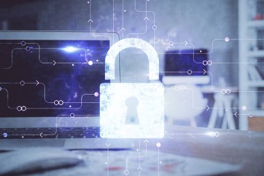 Bilgisayar ve ikon hologramı ile masaüstüne çift pozlama. Veri güvenliği kavramı.