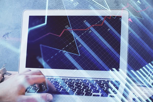 Forex Graph met zakenman werken aan laptop op de achtergrond. Concept van hard werken. Multi exposure. — Stockfoto