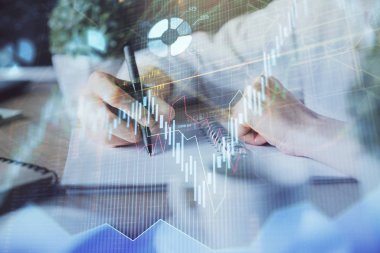 Finansal Forex grafik eller notları arka plan alarak görüntülenir. Araştırma kavramı. Çift Pozlama