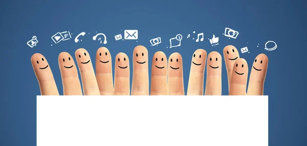 Happy group of finger smileys with social media icons — Stock Photo, Image