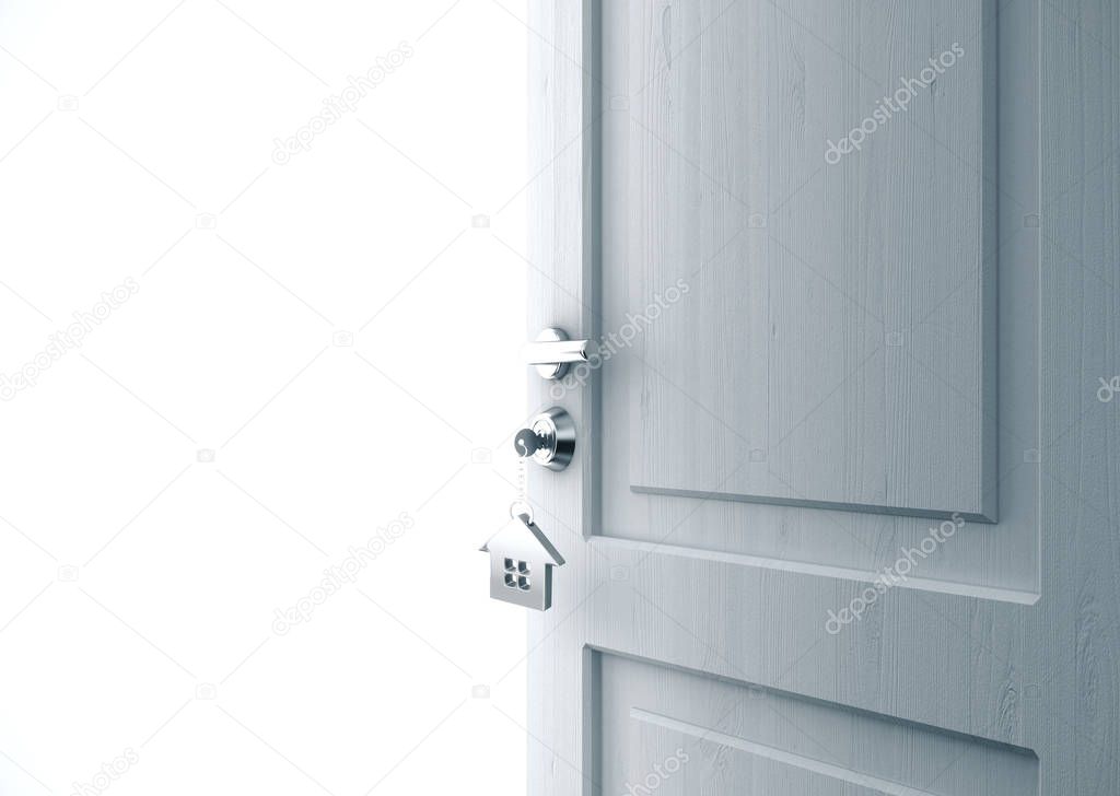 Opened door with key in lock