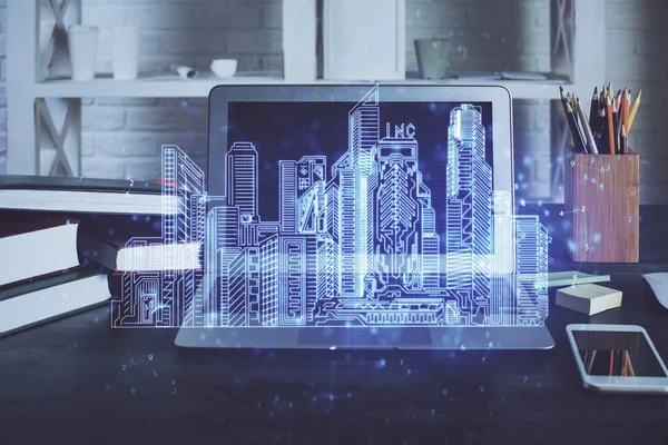 Skrivbordsdator bakgrund i kontor och storstadshus hologram ritning. Dubbel exponering. Smart stadskoncept. — Stockfoto