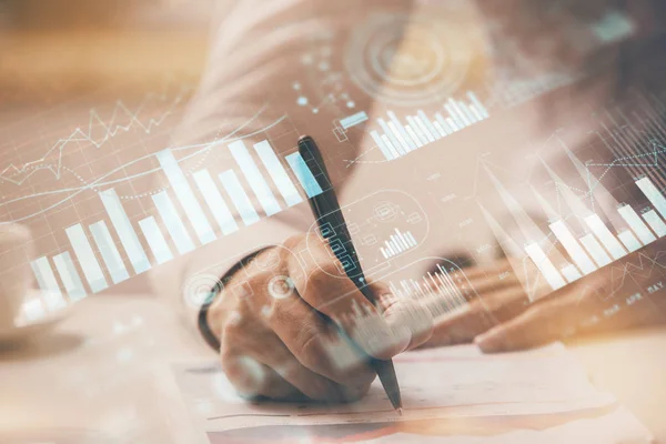 Financial trading chart multi exposure with man desktop background.