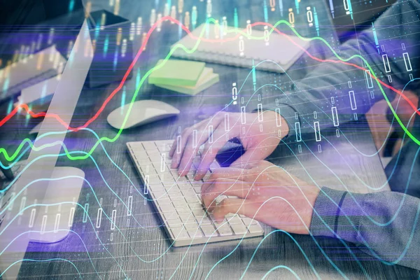 Stock graph with businessman typing on computer in office on background. Concept of analysis. Double exposure. — Stock Photo, Image