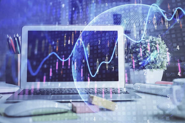 Double exposure of chart and financial info and work space with computer background. Concept of international online trading.