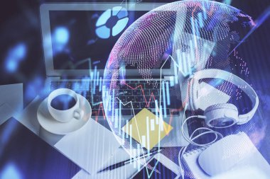 Grafik ve finansal bilgilere çifte maruz kalma ve bilgisayar geçmişi olan çalışma alanı. Uluslararası çevrimiçi ticaret kavramı.