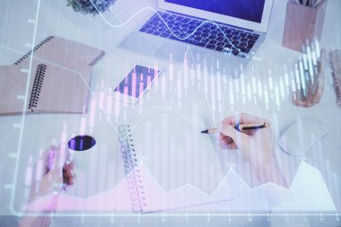 Hands Not defteri hisse senedi piyasası hakkında bilgi yazma. Ön Forex grafik hologramlar. Araştırma kavramı. Çoklu pozlama