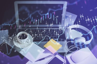 Finansal tablo çizimi ve arka planda bilgisayar olan bir tablo. Çifte maruziyet. Uluslararası pazarlar kavramı.