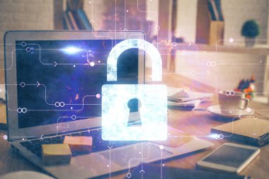 Bilgisayar ve ikon hologramı ile masaüstüne çift pozlama. Veri güvenliği kavramı.