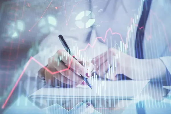 Double exposure of hands making notes with forex chart huds. Stock market concept. — Stock Photo, Image