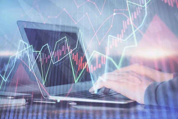 Double exposure of stock market graph with man working on laptop on background. Concept of financial analysis. — Stock Photo, Image