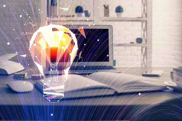 Computer on desktop in office with bulb icon hologram. Multi exposure. Concept of idea. — Stock Photo, Image