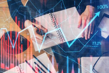 Forex grafik hologram el notları arka plan alarak. Analiz kavramı. Çoklu pozlama